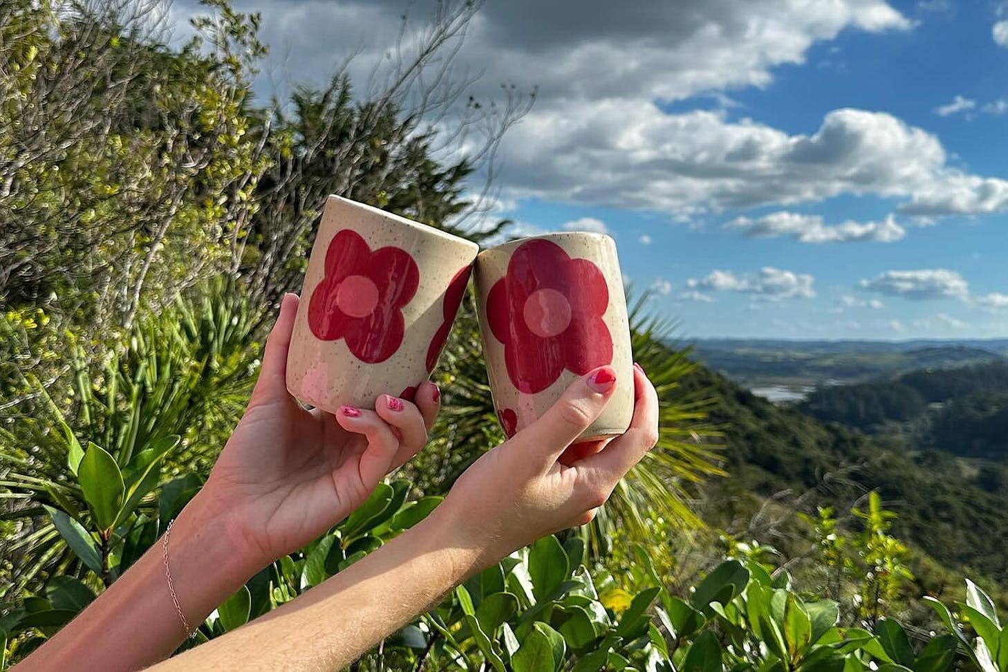 Two mugs that you could have painted at Coffee, Croissants & Clay, one of the best things to do with mum this Mother’s Day.